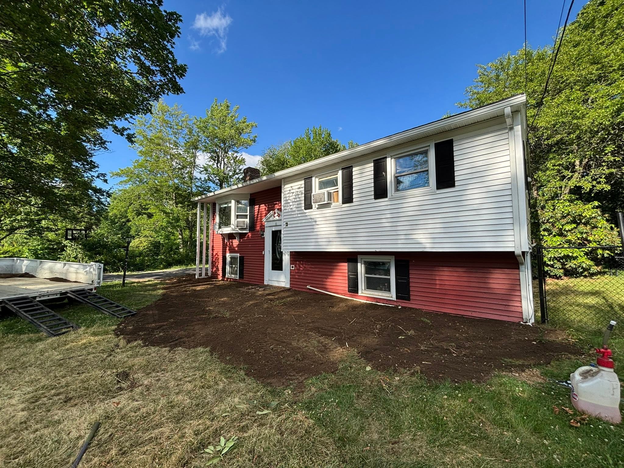 Property after full shrub and stump clearing — roots removed